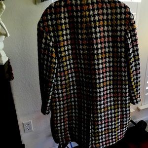 J Crew beautiful plaid overcoat in pinks and yellows accented by gold buttons.